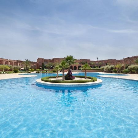 Grand Mogador Agdal Palace Marraquexe Exterior foto The swimming pool at the hotel