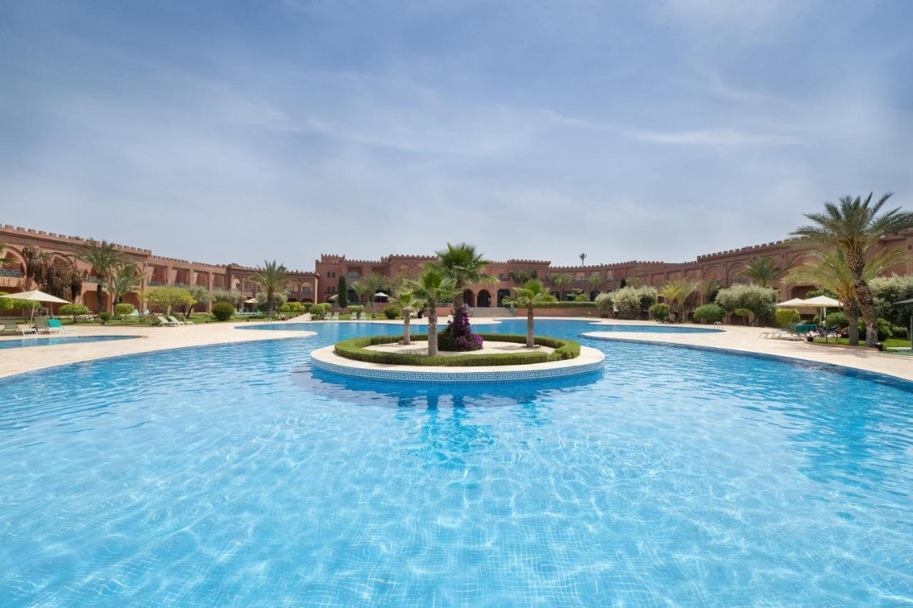Grand Mogador Agdal Palace Marraquexe Exterior foto The swimming pool at the hotel